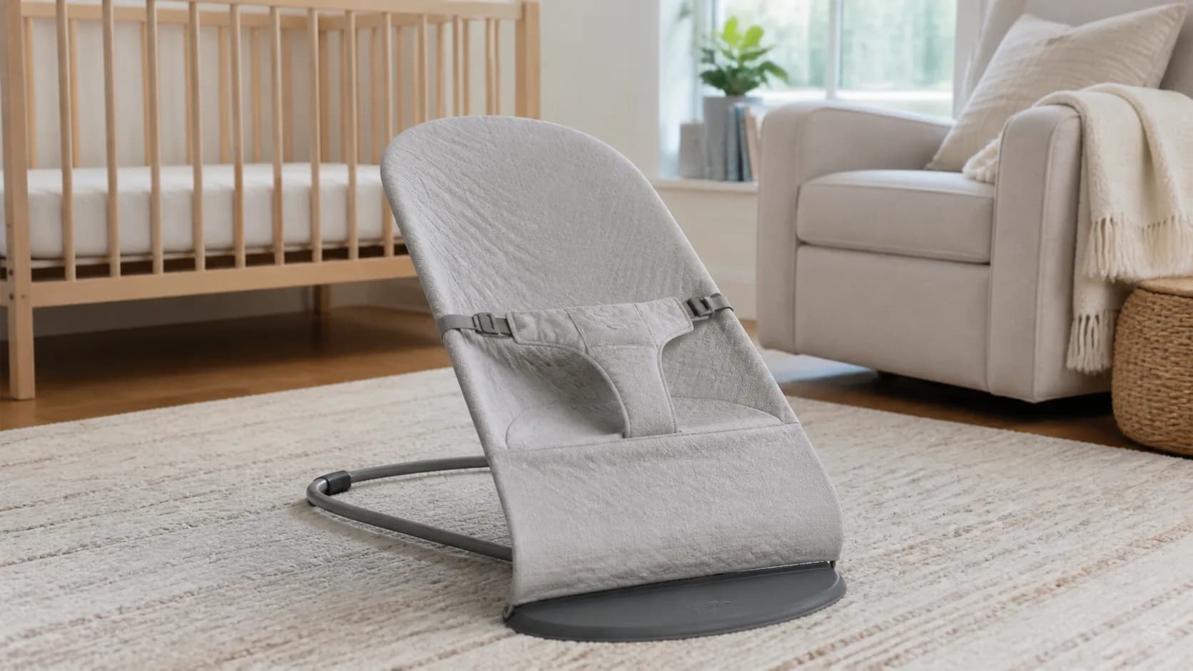 Editorial nursery scene representing an awake and supervised baby-bouncer setup